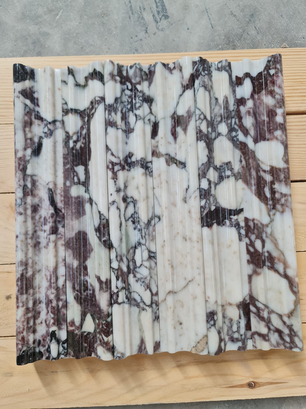 Mouldings · Calacatta Viola Extra Chair Rail · Polished natural stone moulding — surface and veining