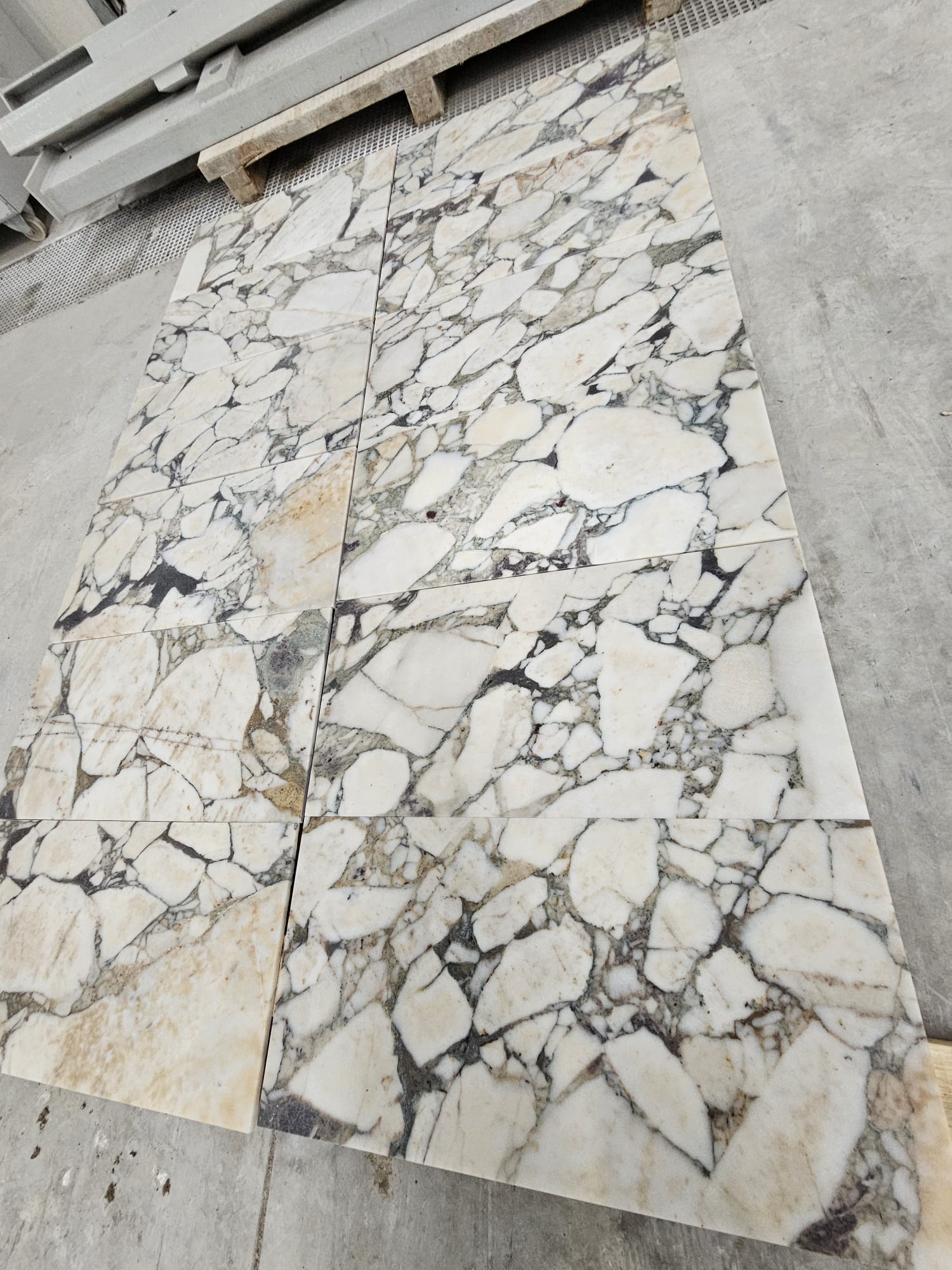 Calacatta Victoria Gold natural stone tile — surface and veining