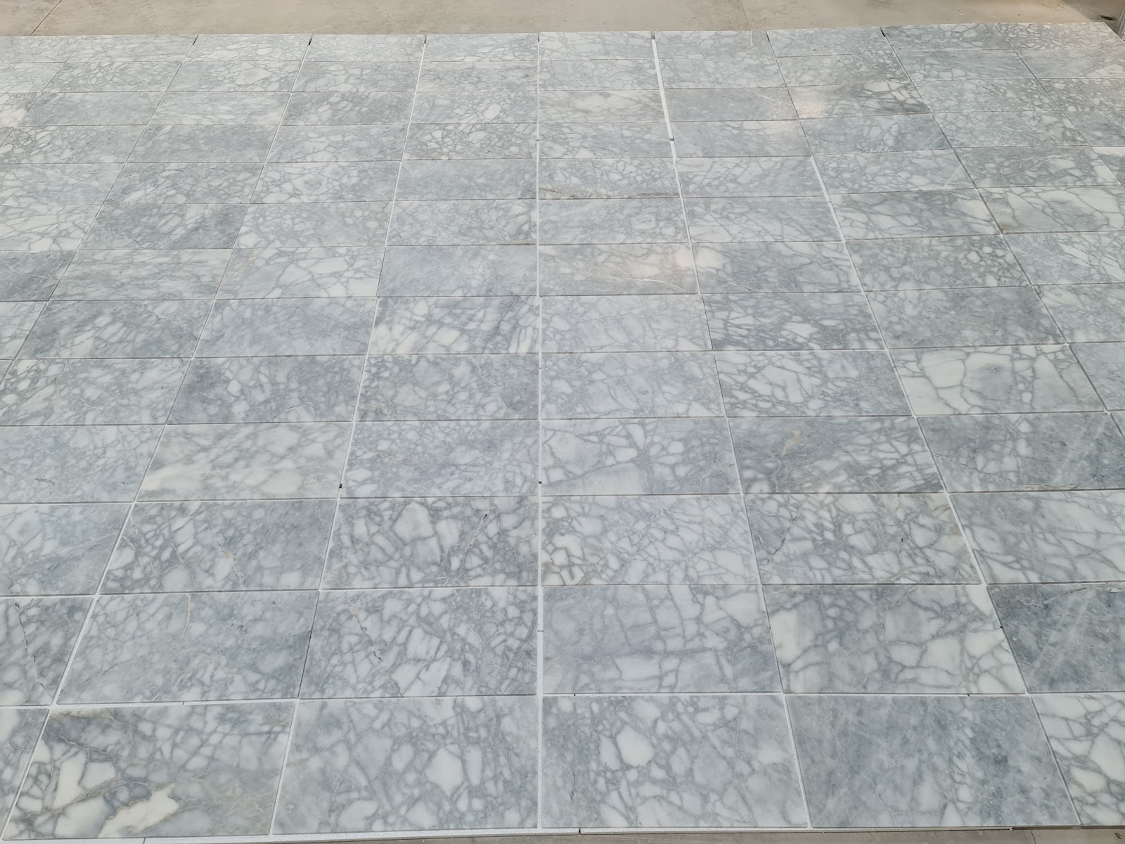 Bianco Venato natural stone tile — surface and veining