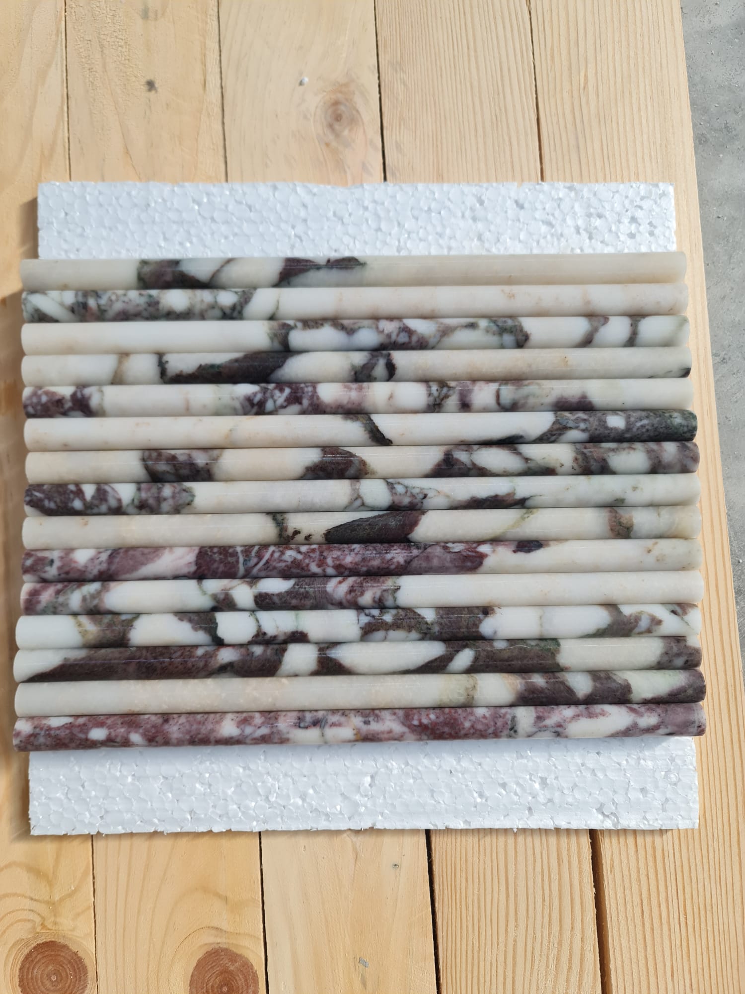 Mouldings · Calacatta Viola Extra Pencil · Honed natural stone moulding — surface and veining